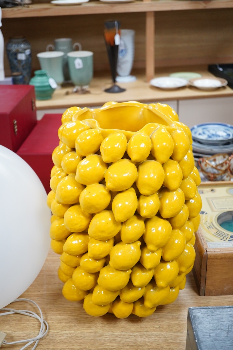 A large yellow glazed ceramic ‘lemons’ vase, 45cm